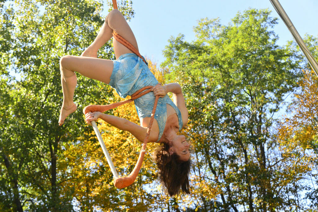 Nimble Arts performer on a trapese